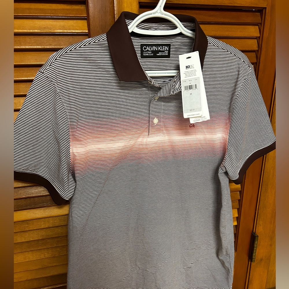 Calvin Klein men’s Liquid Touch Polo. Size Med. Brand New with tags.